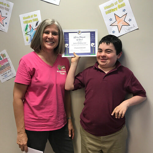 Boy with certificate